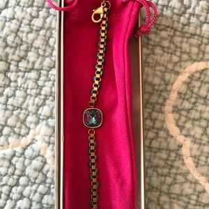 Brass bracelet with emerald